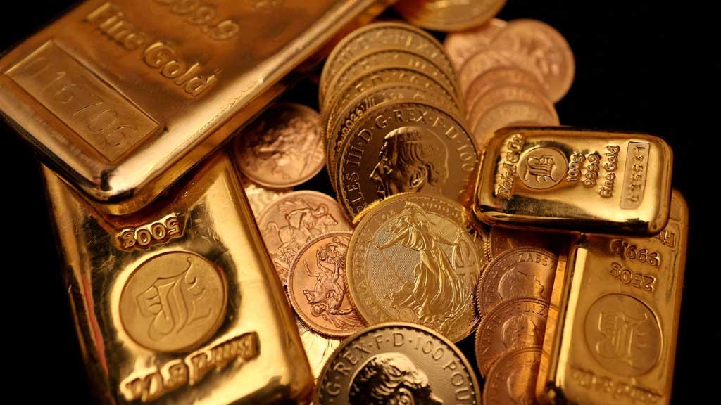 Gold blasts past $5,000 to record high on safe-haven rush
